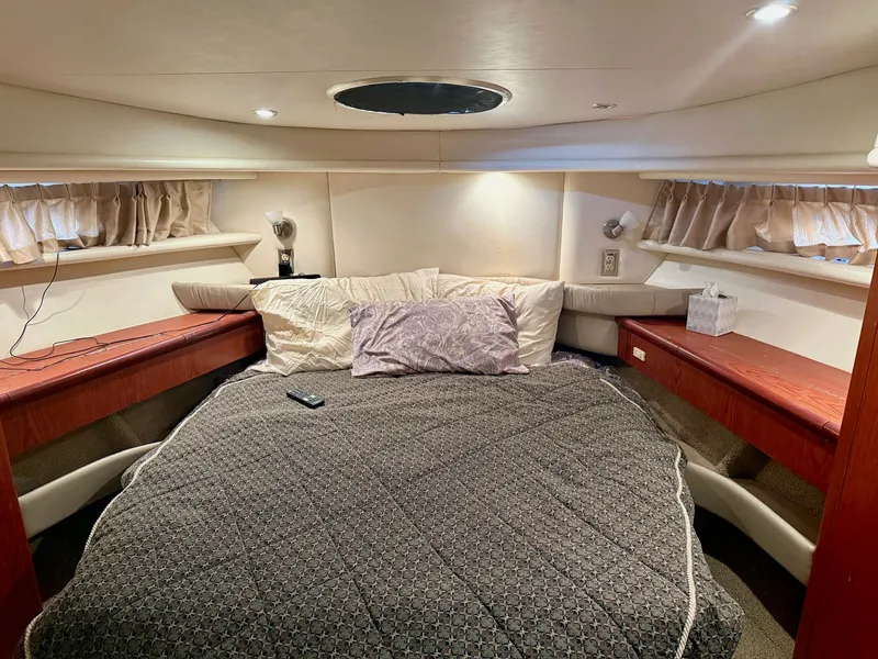 Slide: The Image of 1999 Maxum 4100 SCA yacht interior with cozy bedroom. - 9