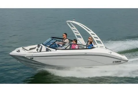 Slide: The Image of 2026 Yamaha Boats 195S cruising on open water with passengers onboard. - 10