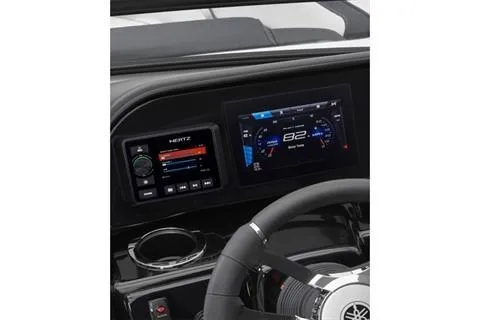 Slide: The Image of Dashboard of 2026 Yamaha Boats 195S with digital displays and steering wheel. - 5