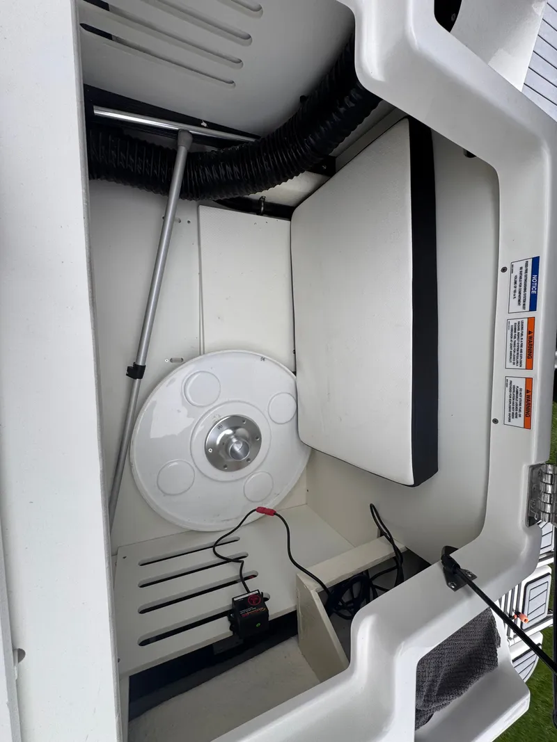 Slide: The Image of Interior of a 2021 Sea Ray SPX 190 Outboard boat. - 14
