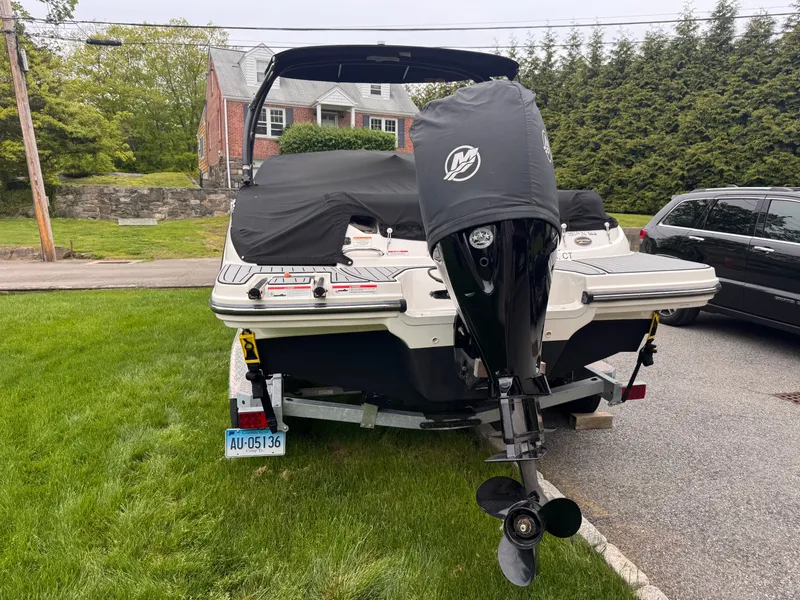 Slide: The Image of 2021 Sea Ray SPX 190 Outboard on a trailer in a yard. - 5