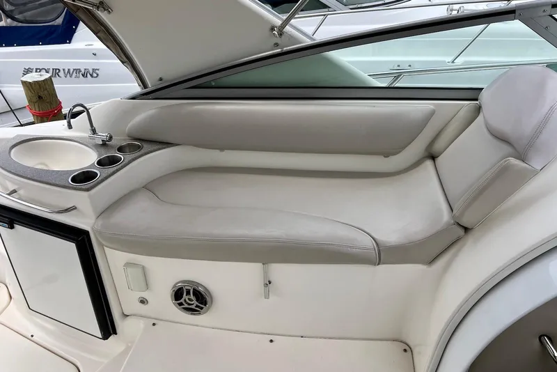 Slide: The Image of Interior of 2009 Larson Cabrio 310 boat with seating and sink area. - 26