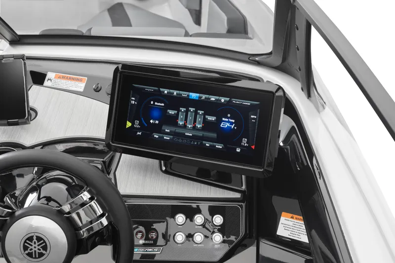 Slide: The Image of 2026 Yamaha Boats 222XD dashboard with advanced touchscreen display and steering wheel. - 2
