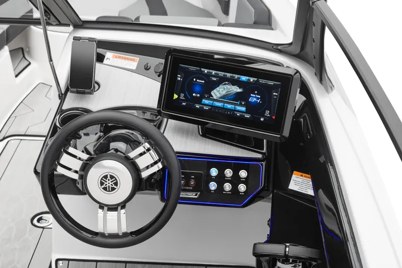 Slide: The Image of 2026 Yamaha Boats 222XD dashboard with advanced touchscreen and sleek steering wheel design. - 3