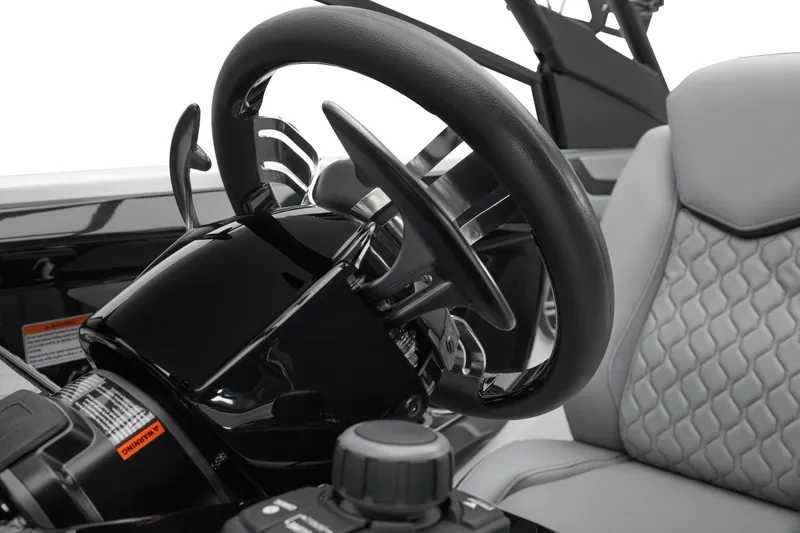 Slide: The Image of 2026 Yamaha Boats 222XD steering wheel and seat detail, showcasing modern design and luxury. - 4