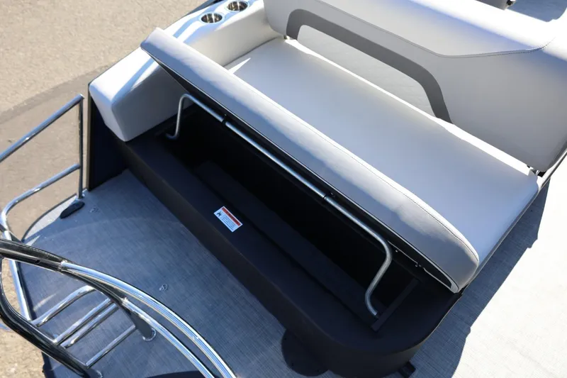 Slide: The Image of 2026 Lowe SS 230 CL boat seat with storage compartment and cup holders. - 19