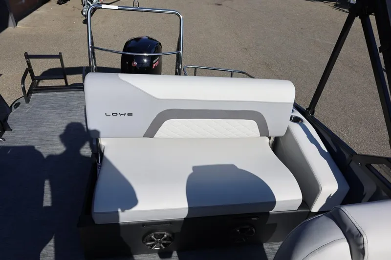 Slide: The Image of 2026 Lowe SS 230 CL boat interior with white seating and modern design. - 22
