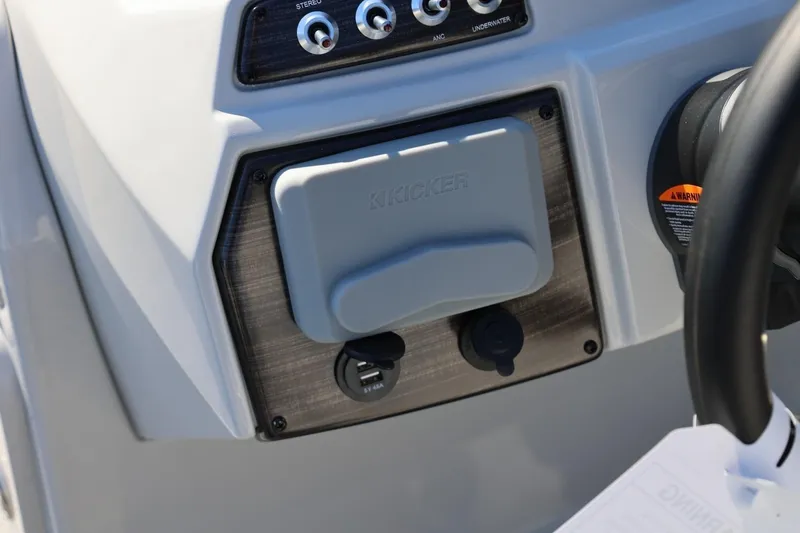 Slide: The Image of Control panel of 2026 Lowe SS 230 CL boat with stereo and Kicker audio system. - 29