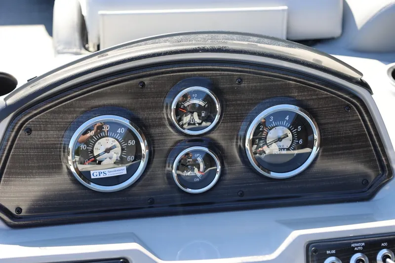 Slide: The Image of Dashboard of 2026 Lowe SS 230 CL boat with gauges and GPS speedometer. - 30
