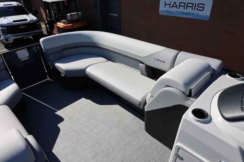 Slide: The Image of 2026 Lowe SS 230 CL pontoon boat interior with gray seating and modern design. - 35