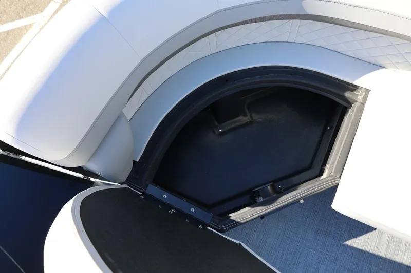 Slide: The Image of Storage compartment in 2026 Lowe SS 230 CL boat with cushioned seating. - 40