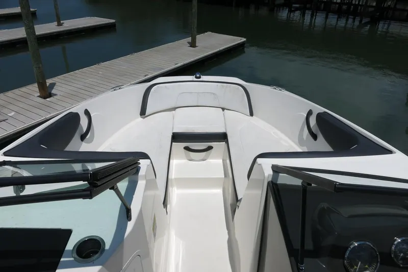 Slide: The Image of 2017 Sea Ray SPX 190 Outboard boat interior, featuring spacious seating and sleek design. - 12