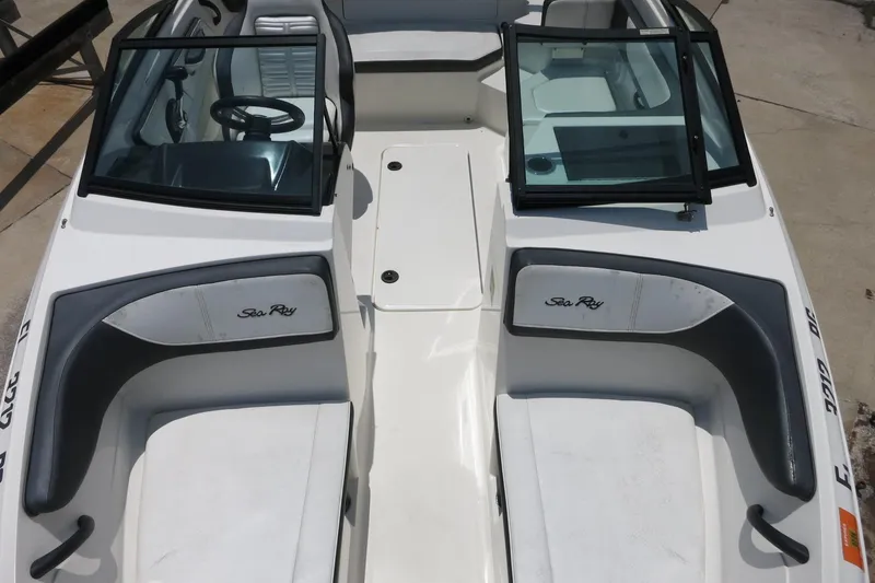 Slide: The Image of 2017 Sea Ray SPX 190 Outboard boat interior with seating and windshield. - 14
