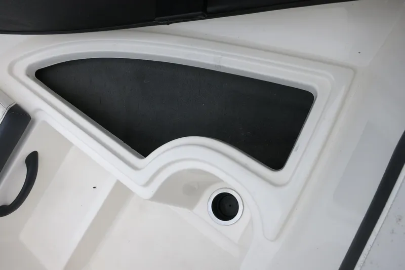 Slide: The Image of 2017 Sea Ray SPX 190 Outboard boat interior detail with storage compartment. - 26