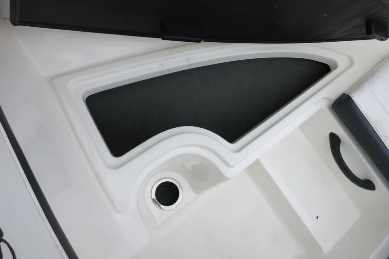 Slide: The Image of 2017 Sea Ray SPX 190 Outboard boat interior detail with storage compartment. - 27