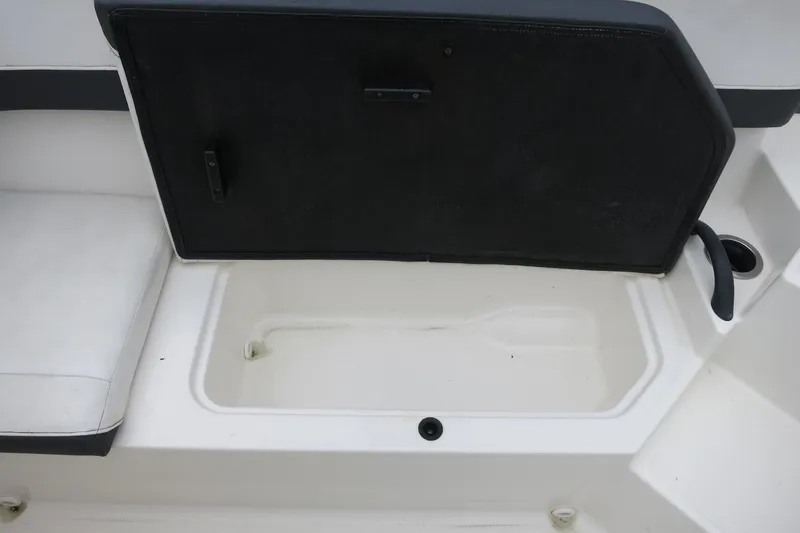 Slide: The Image of Storage compartment on a 2017 Sea Ray SPX 190 Outboard boat. - 28