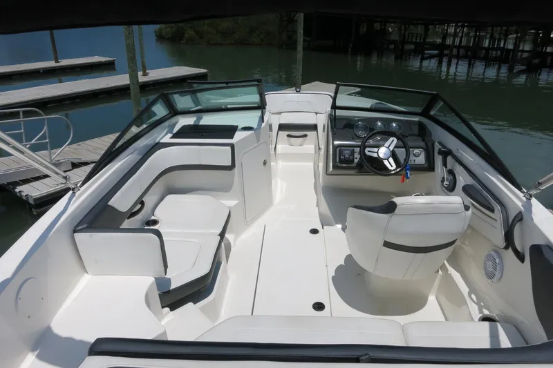 Slide: The Image of 2017 Sea Ray SPX 190 Outboard boat interior with seating and steering console. - 8