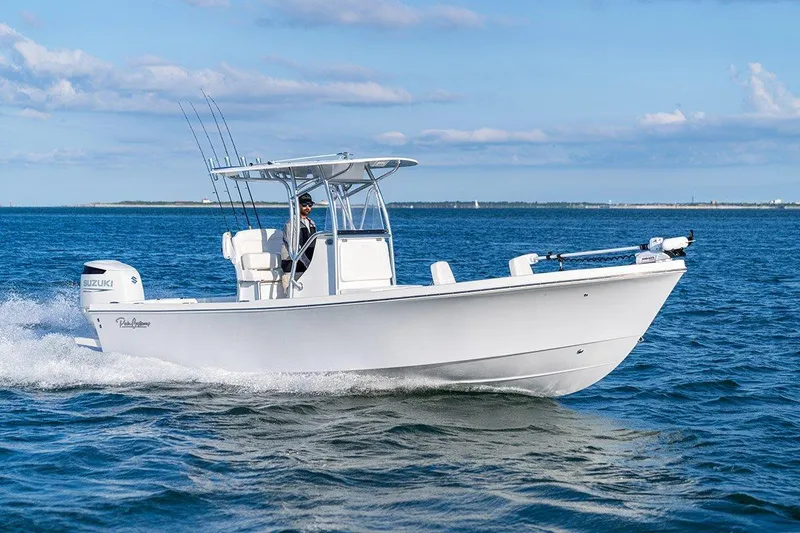 The Image of 2027 Pair Customs 24 Center Console MV boat cruising on open water. - 1