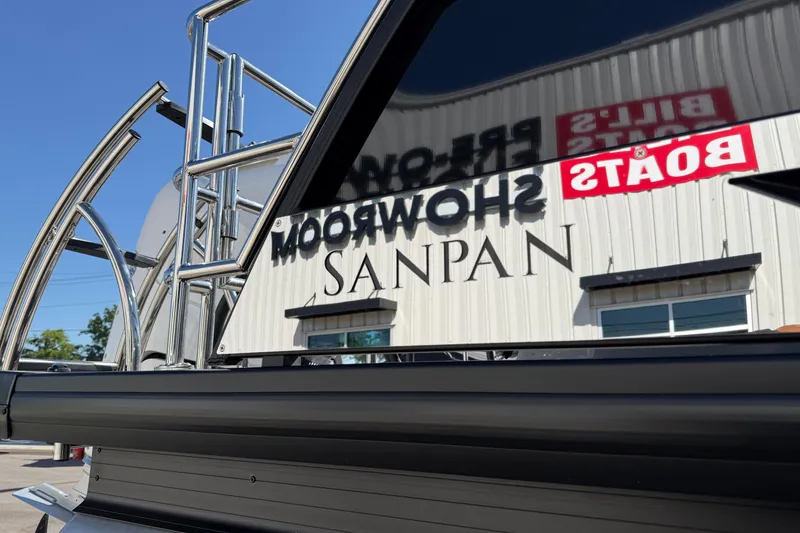Slide: The Image of 2024 Godfrey Sanpan 2500 DFLW boat with showroom reflection. - 5
