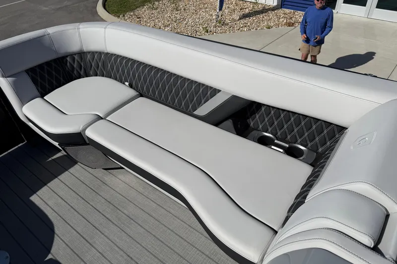 Slide: The Image of Luxurious seating on 2024 Godfrey Sanpan 2500 DFLW pontoon boat with cup holders. - 7