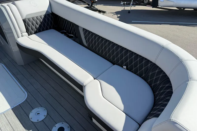 Slide: The Image of Luxurious seating on 2024 Godfrey Sanpan 2500 DFLW pontoon boat with quilted upholstery. - 8