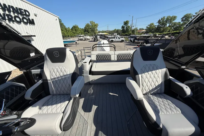 Slide: The Image of 2024 Godfrey Sanpan 2500 DFLW pontoon boat interior with luxury seating. - 9