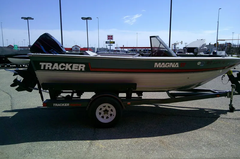 Slide: The Image of 1989 Bass Tracker Pro Deep V-17 boat on trailer in parking lot. - 5