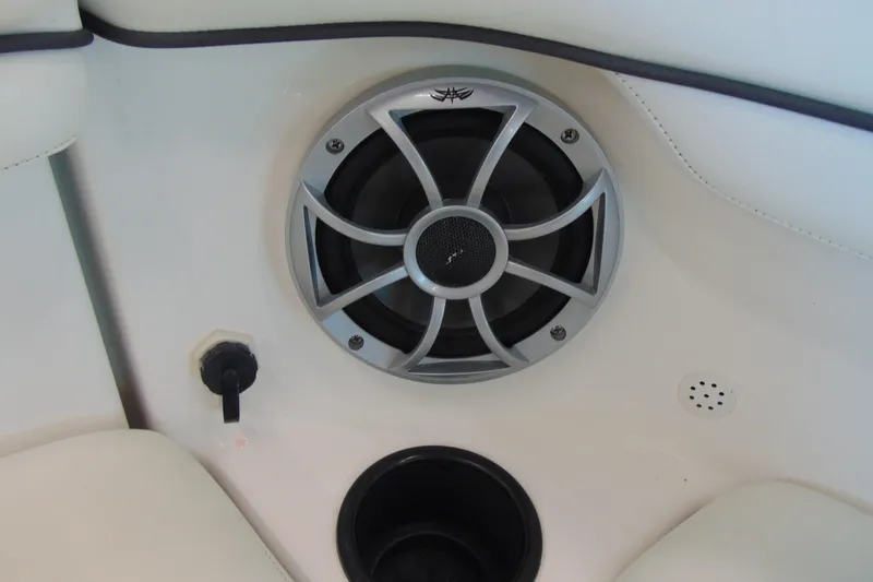 Slide: The Image of Speaker and controls on 2014 Yamaha AR210 boat interior. - 16
