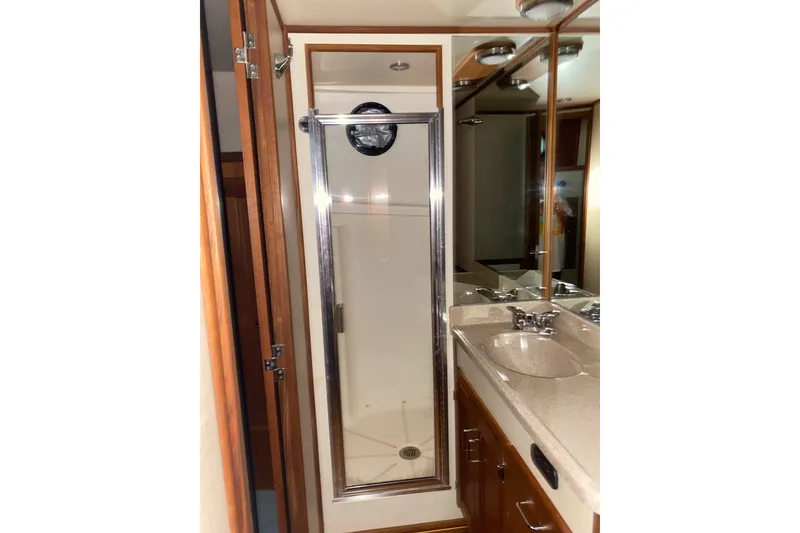 Slide: The Image of Bathroom interior of 2003 American Tug 34 with shower and sink. - 14