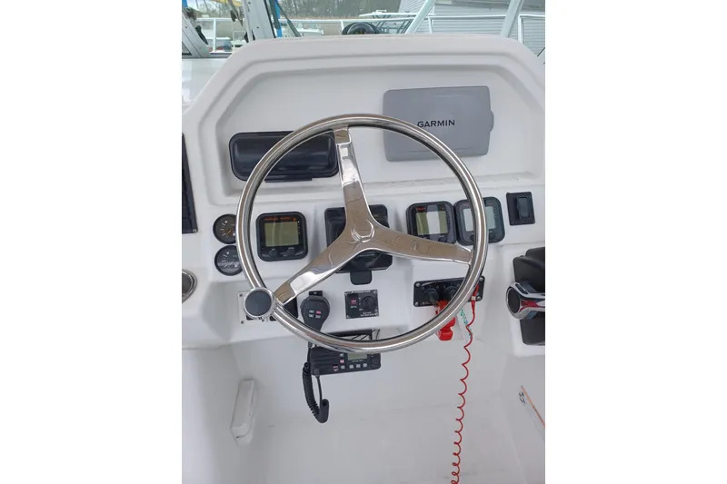 Slide: The Image of Steering console of 2008 Glacier Bay 2270 Isle Runner with Garmin navigation system. - 7