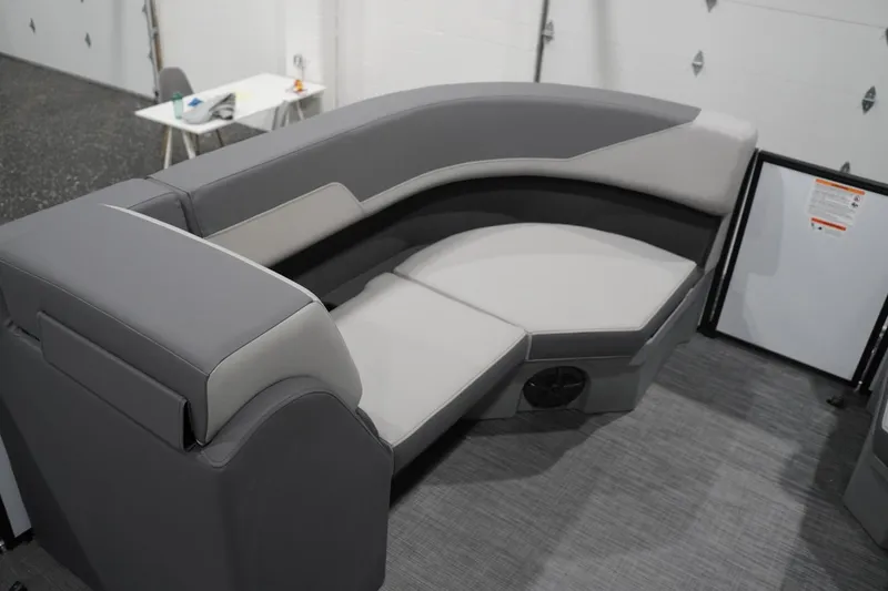 Slide: The Image of Luxurious seating in 2026 Lowe LS 190 boat, featuring modern gray upholstery. - 19