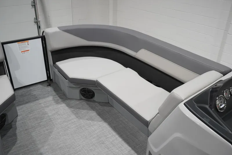 Slide: The Image of Interior seating of 2026 Lowe LS 190 boat, featuring modern gray upholstery. - 20