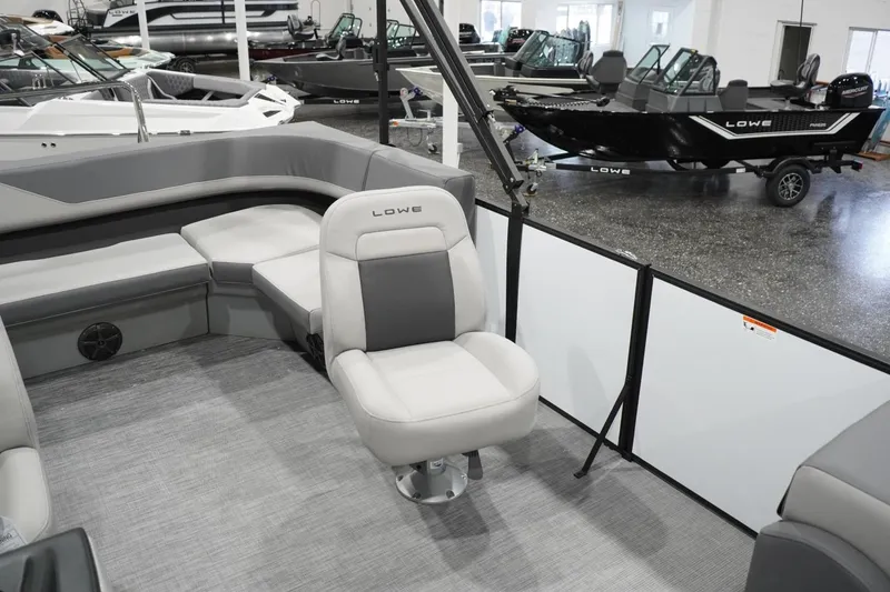 Slide: The Image of Interior of 2026 Lowe LS 190 boat with gray seating and modern design. - 29