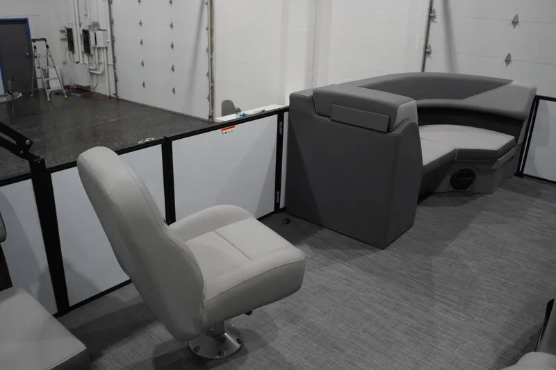 Slide: The Image of Interior of 2026 Lowe LS 190 boat with gray seating and modern design. - 30