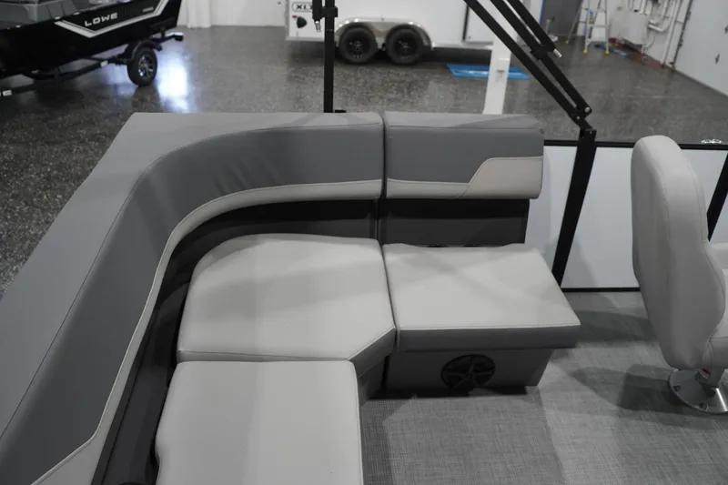 Slide: The Image of 2026 Lowe LS 190 boat interior with gray cushioned seating and modern design. - 33