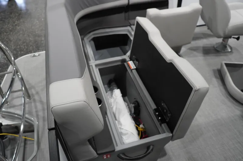 Slide: The Image of Interior view of 2026 Lowe LS 190 boat with open storage compartment. - 37