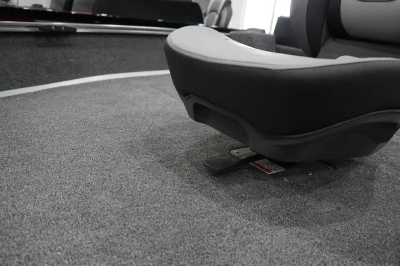 Slide: The Image of Boat interior with a gray seat on carpeted flooring, Lowe LS 190, 2026 model. - 9