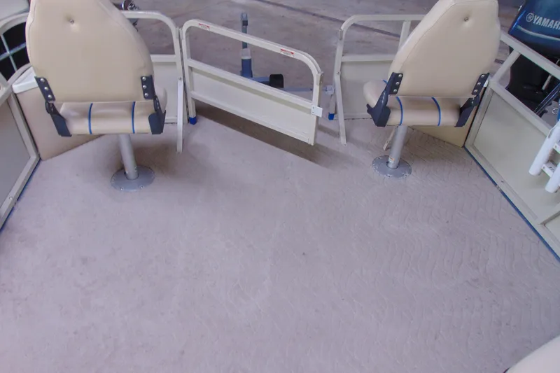Slide: The Image of 2010 Bentley Pontoons 220 Fish interior with beige seating and open gate. - 9