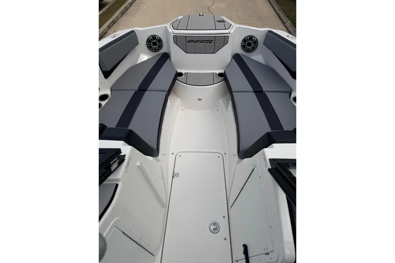 Slide: The Image of Interior view of 2026 Yamaha Boats 222XD with gray seating. - 11