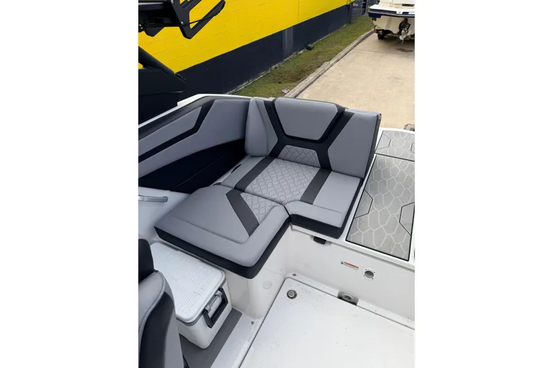 Slide: The Image of Interior of 2026 Yamaha Boats 222XD with gray upholstery. - 15