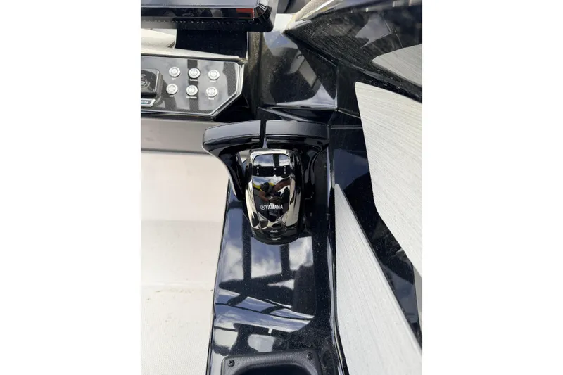 Slide: The Image of Yamaha Boats 222XD 2026 control console with controls. - 17