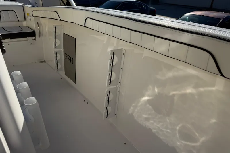 Slide: The Image of Interior view of 2026 Yamaha Boats 252 FSH Sport, showcasing seating and storage features. - 37