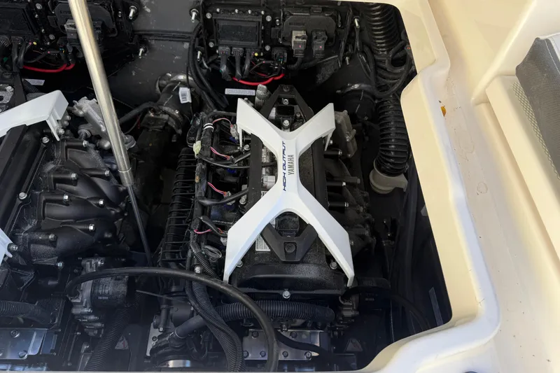 Slide: The Image of Engine compartment of 2026 Yamaha Boats 252 FSH Sport, showcasing high-output components. - 42