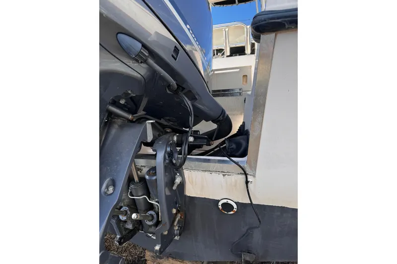 Slide: The Image of 1999 Grady-White Fisherman 222 boat engine detail, showcasing mechanical components. - 14
