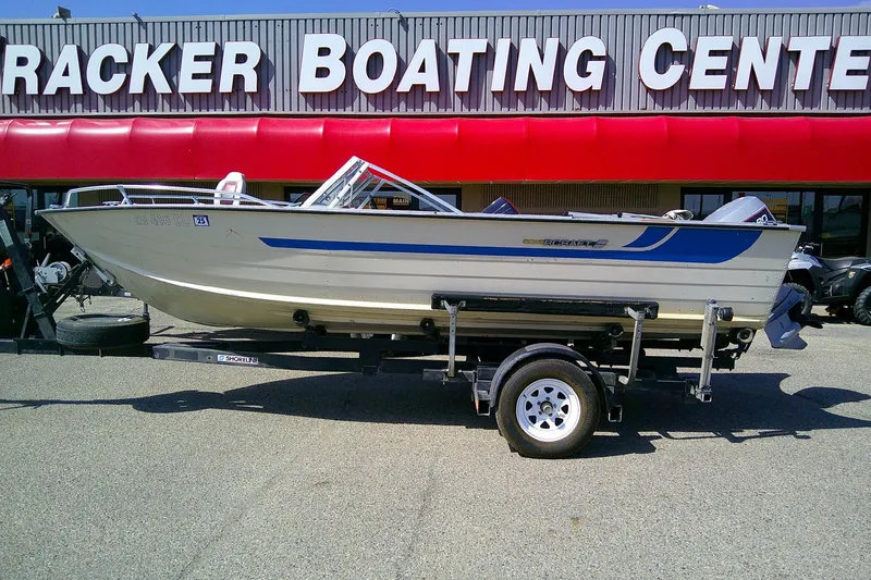 Slide: The Image of 1981 Starcraft SuperSport 160 boat on trailer at Tracker Boating Center. - 2