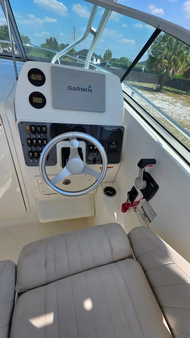 Slide: The Image of 2007 Hydra-Sports Vector 2200 VX cockpit with Garmin controls. - 10