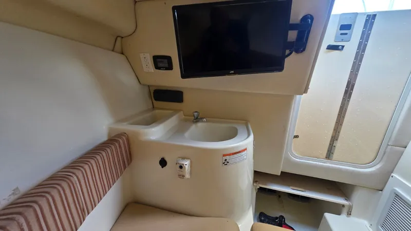 Slide: The Image of Interior of 2007 Hydra-Sports Vector 2200 VX with sink and TV. - 16