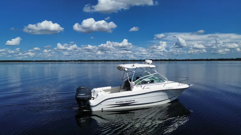 Slide: The Image of 2007 Hydra-Sports Vector 2200 VX on calm water under blue sky. - 4