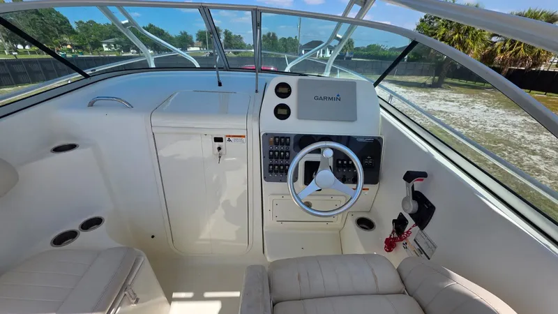 Slide: The Image of Interior of a 2007 Hydra-Sports Vector 2200 VX boat with Garmin controls. - 9