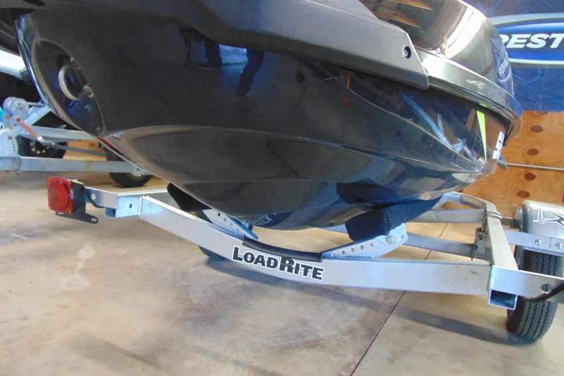 Slide: The Image of 2016 Sea-Doo GTI SE 130 on Load Rite trailer in garage setting. - 12